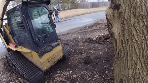 pushing down trees with skid steer|skid steer for fence removal.